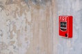 Fire alarm system box installed on wall in old building Royalty Free Stock Photo