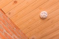 Fire alarm on wooden ceiling in interior smoke detector safety and home protection from dangerous with fire, close-up Royalty Free Stock Photo