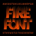 Fire alphabet font. Flame effect type letters and numbers on black background. Royalty Free Stock Photo