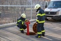 Firefighters check fire hydrants.