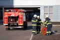 Firefighters check fire hydrants.