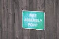 Fire assembly point sign at office work place Royalty Free Stock Photo