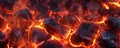 A fire background featuring glowing embers and smoldering coals, with soft, flickering flames Royalty Free Stock Photo