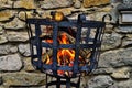 Fire in a fire basket Royalty Free Stock Photo