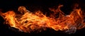 fire on a black background, burning and hot flames, close view