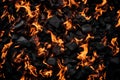 Fire on black coal background. A buring landscape with fire on the ground
