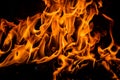 Fire blaze flames on black background. Fire burn flame isolated, abstract texture. Flaming explosion with burning effect Royalty Free Stock Photo