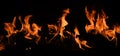 Fire blaze flames on black background. Fire burn flame isolated, abstract texture. Flaming explosion effect with burning Royalty Free Stock Photo