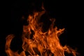 Fire blaze flames on black background. Fire burn flame isolated, abstract texture. Flaming explosion effect with burning fire. Royalty Free Stock Photo