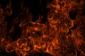 Fire blaze flames on black background. Fire burn flame isolated, abstract texture. Flaming explosion with burning effect Royalty Free Stock Photo