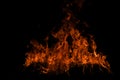 Fire blaze flames on black background. Fire burn flame isolated, abstract texture. Flaming explosion effect with burning Royalty Free Stock Photo
