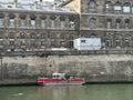 Fire boat and old building along the River Seine in Paris, France Royalty Free Stock Photo