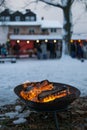 Fire bowl in the winter at a christmas market, Germany. Royalty Free Stock Photo