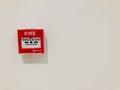 Fire break glass alarm switch on the concrete wall. Copy space Royalty Free Stock Photo