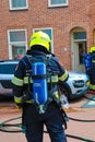 Dutch firefighter at a house fire Royalty Free Stock Photo