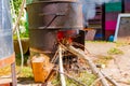 Fire flames under distillation apparatus for making domestic alcohol liquor Royalty Free Stock Photo