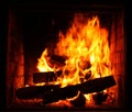 Fire in burning fireplace in winter close-up Royalty Free Stock Photo