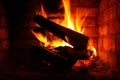 Fire in burning fireplace in winter close-up Royalty Free Stock Photo