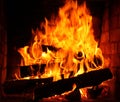 Fire in burning fireplace in winter close-up Royalty Free Stock Photo