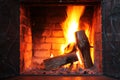 Fire in burning fireplace in winter close-up Royalty Free Stock Photo