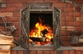 Fire in burning fireplace in winter close-up Royalty Free Stock Photo