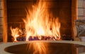 A fire burning in a fireplace, winter vacation in country house