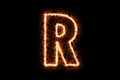 Fire burning forming letter R, capital English alphabet text character isolated on black background. 3d rendering illustration. Royalty Free Stock Photo