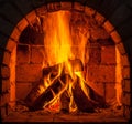 A fire burns in a fireplace Royalty Free Stock Photo