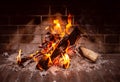 The fire burns in the fireplace close Royalty Free Stock Photo