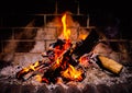 The fire burns in the fireplace close Royalty Free Stock Photo