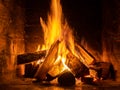 A fire burns in a fireplace  Fire to keep warm Royalty Free Stock Photo