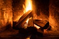 A fire burns in a fireplace  Fire to keep warm Royalty Free Stock Photo