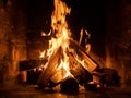 A fire burns in a fireplace  Fire to keep warm Royalty Free Stock Photo