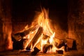 A fire burns in a fireplace  Fire to keep warm Royalty Free Stock Photo