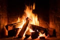 A fire burns in a fireplace  Fire to keep warm Royalty Free Stock Photo