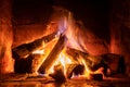 A fire burns in a fireplace  Fire to keep warm Royalty Free Stock Photo