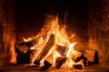 A fire burns in a fireplace  Fire to keep warm Royalty Free Stock Photo