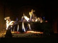 A fire burns in a fireplace Royalty Free Stock Photo