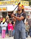 Fire busker juggle twirl Royalty Free Stock Photo