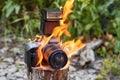 Fire at the campsite, photo equipment destroyed Royalty Free Stock Photo