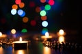 Fire of candle on christmas background. Christmas candles burning at night. Abstract candles background. Royalty Free Stock Photo