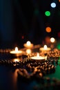 Christmas candles burning at night. Abstract candles background. Golden light of candle flame. Hope, fire. Royalty Free Stock Photo