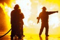 Fire chief pointing to the right during a firefighting exercise