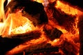 Fire. Closeup of pile of wood burning with flames in the fireplace. Royalty Free Stock Photo