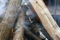 Fire. Closeup of pile of wood burning with flames in the fireplace Royalty Free Stock Photo