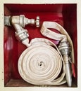 Fire with stacked hose, modern system Royalty Free Stock Photo