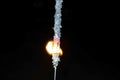 fire coming out of a burning sparkler