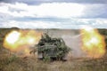 Fire is conducted from an artillery gun Royalty Free Stock Photo