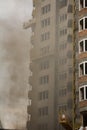 Fire At a construction site, unfinished multi-storey reinforced concrete building Royalty Free Stock Photo