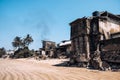 Fire damaged buildings in the middle of popular touristic beach in Sri Lanka. Polluted and damaged place near surfing beach Royalty Free Stock Photo